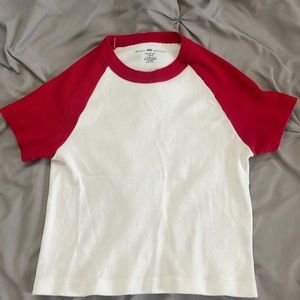 Brandy Melville white and red baby tee.